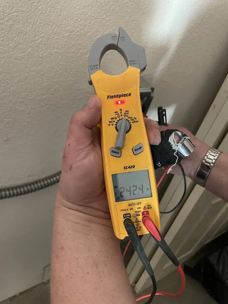 Voltage testing with clamp meter during Hot Tub / Pool Electrical Wiring in Noblesville